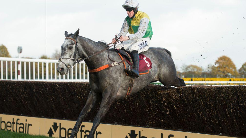 Cloudy Dream (Brian Hughes) jumps the last on his way to victory in the graduation chase