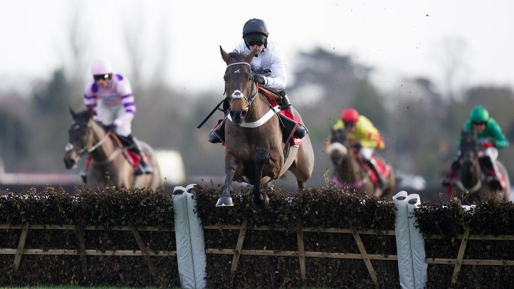 Constitution Hill (Nico de Boinville) clears the final flight to win the Christmas Hurdle at Kempton