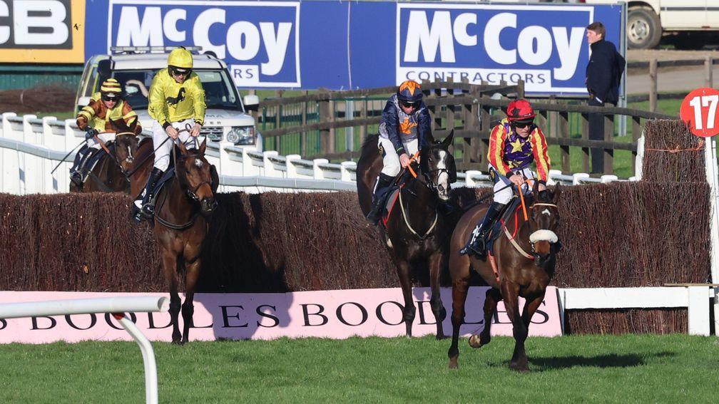 Billaway and Patrick Mullins (left) graduially reel in Winged Leader at the climax of the Hunters' Chase
