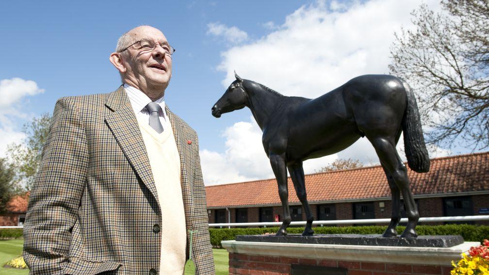 Laurie Williamson stands proudly in front of the statue of his beloved Brigadier Gerard at Newmarket