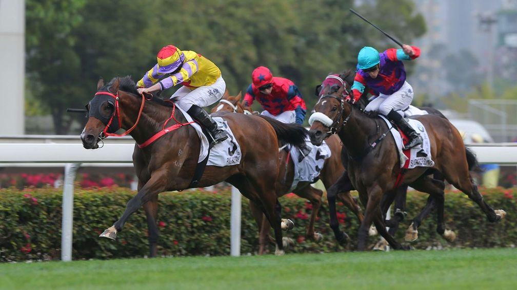 Ryan Moore drives Ping Hai Star clear of Singapore Sling in the BMW Hong Kong Derby