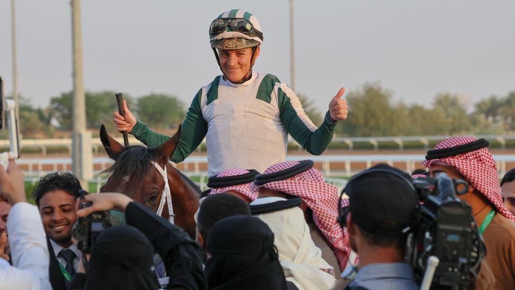 Maryline Eon celebrates after her success in the second stage of the International Jockeys Challenge