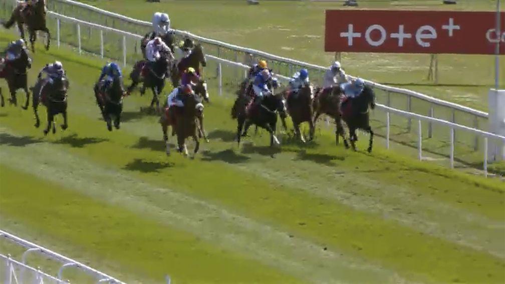Dettori's mount quickens up impressively, hitting the front within a matter of strides