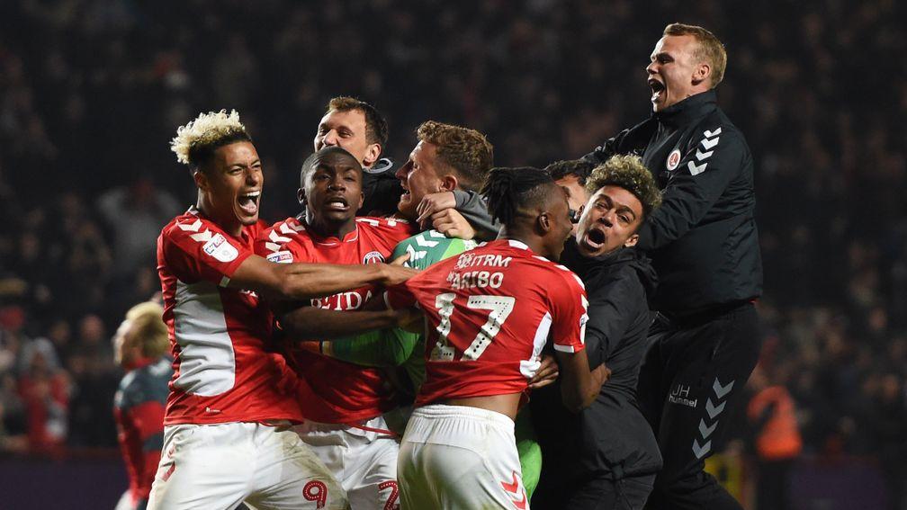 Charlton celebrate gaining their playoff final place after beating Doncaster on penalties