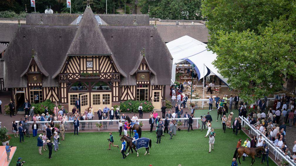 Mysterious Night is lead into Deauville's winner's enclosure