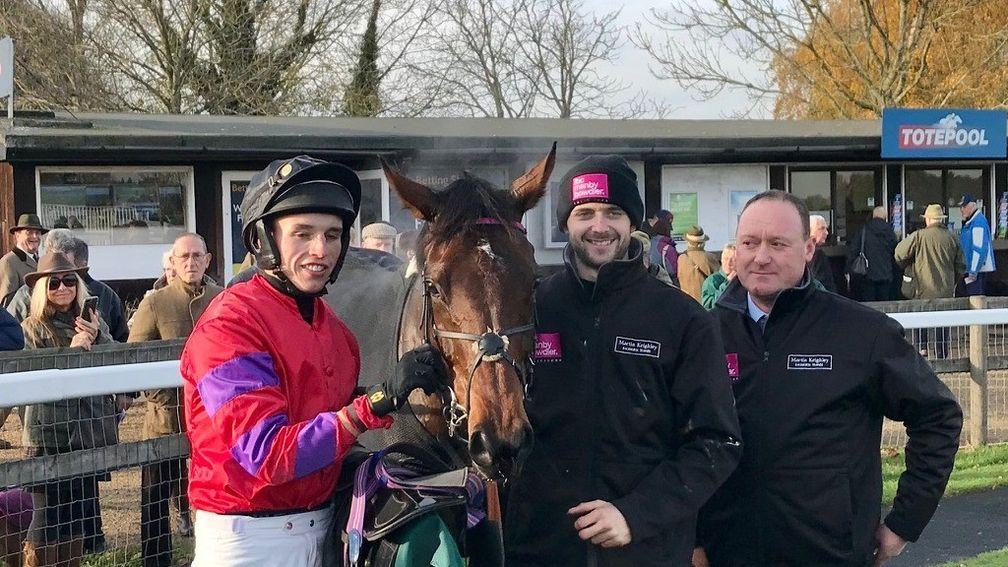 Chequered View and connections after winning the mares' handicap chase at Fakenham