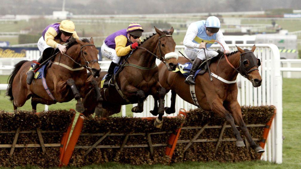 Hardy Eustace (right), Harchibald and Brave Inca (left) jump the last together in the 2005 Champion Hurdle