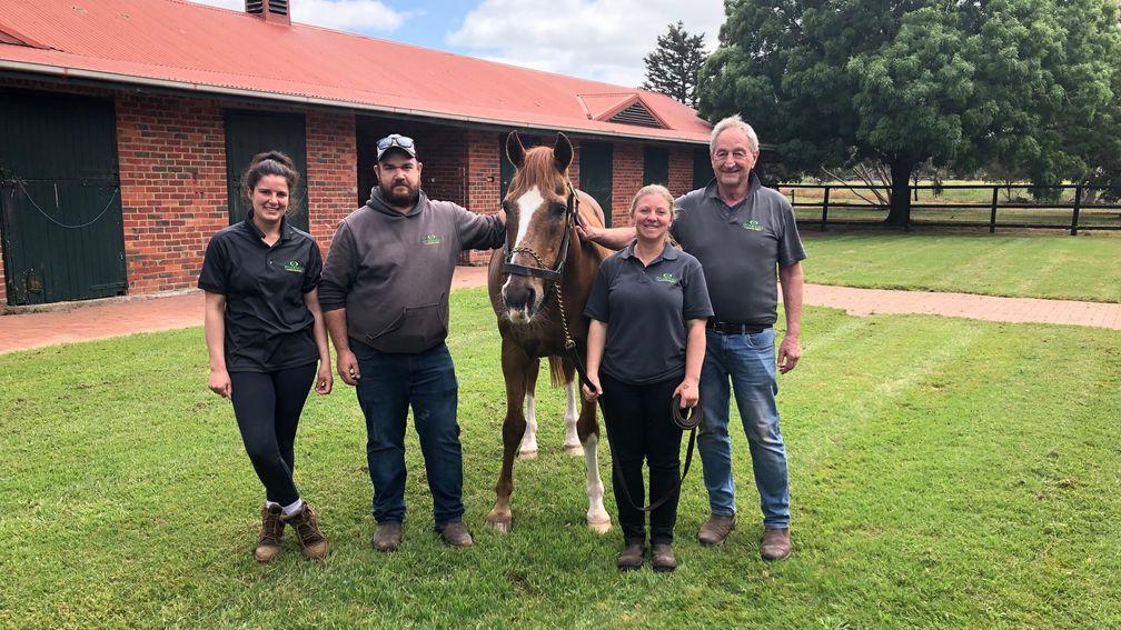 Arazi stood with the Stockwell Thoroughbreds team for a photo in 2019