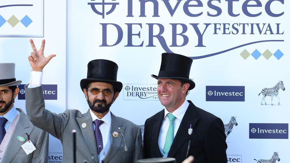 EPSOM, ENGLAND - JUNE 02:  Godolphin owner Sheikh Mohammed celebrates his horse Masar winning the Investec Derby race with trainer Charlie Appleby on Derby Day at Epsom Downs on June 2, 2018 in Epsom, England.  (Photo by Warren Little/Getty Images)