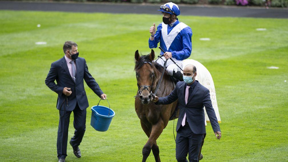 Lord North and James Doyle return to the winner's enclosure after victory in the Prince of Wales's Stakes