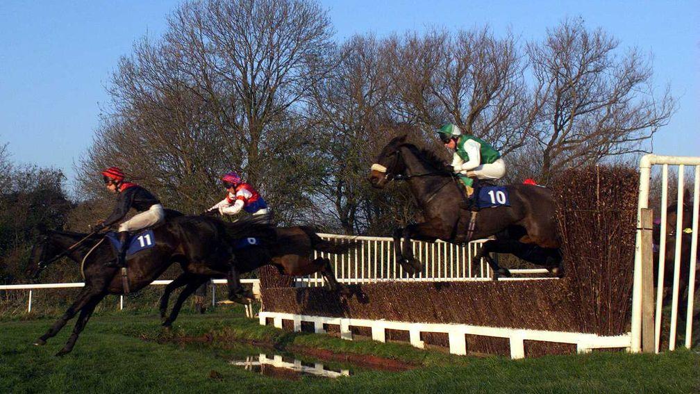 The field clears the water at a Windsor jump fixture in November 1998