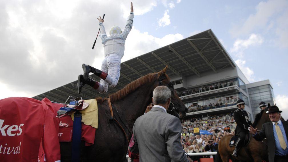 Frankie Dettori performs his trademark flying dismount after Conduit's St Leger triumph