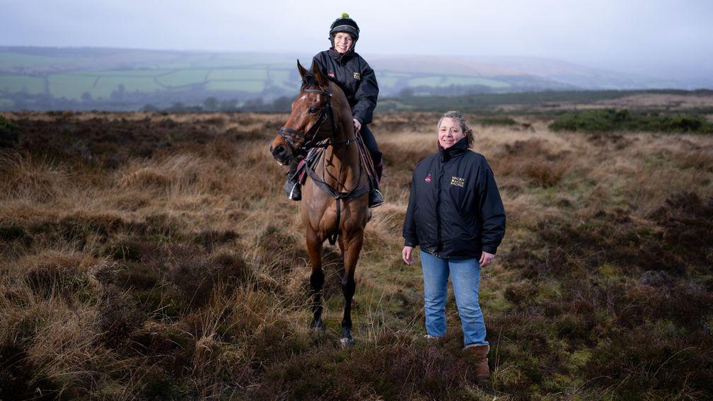 Trainer Nicky Martin with the Welsh National winner The Two Amigos ( Gemma Webber) on top of Exmoor , her training base , 1300 feet above sea level at Great Bradley estate, Withypool 4.1.23 Pic: Edward Whitaker