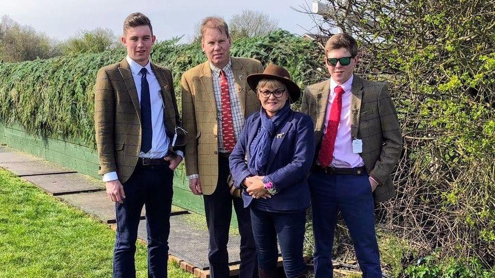 Tim Jones (right) with brother Christopher, father Simon and mother Sally during a trip to Aintree one month before he died
