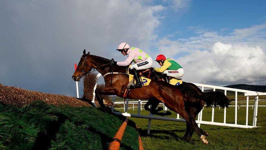 Douvan and Ruby Walsh (near side) in action at Punchestown