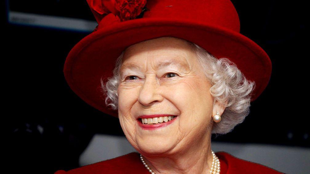 Britain's Queen Elizabeth II smiles as she tours RAF Valley in Anglesey, Wales on April 1, 2011. Britain's Queen Elizabeth II and Prince Philip, The Duke of Edinburgh today visited RAF Valley in Anglesey in high and were given a personal tour of an RAF se
