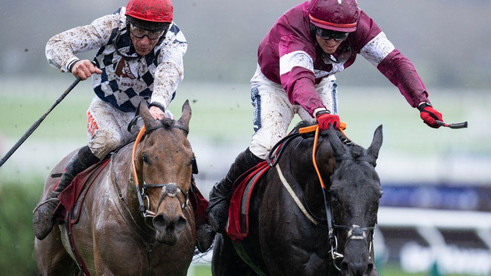 Davy Russell and Galvin (left) are just edged out by Delta Work at Cheltenham 