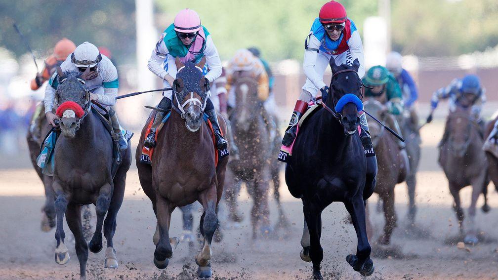 Medina Spirit (red cap): the Kentucky Derby winner collapsed and died after a workout on December 6 at Santa Anita