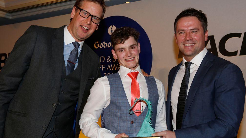Adrian Stewart receives his award from Ed Chamberlin and Michael Owen