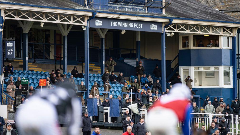 A sparse crowd watch the runners in the EBF NH novices hurdle pass the standsLeicester 29.1.20 Pic: Edward Whitaker