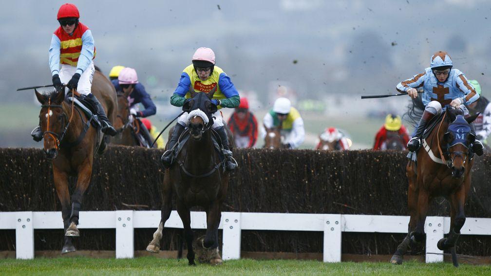Hunt Ball (left, Nick Scholfield) comes to claim his moment of glory at the 2012 Cheltenham Festival