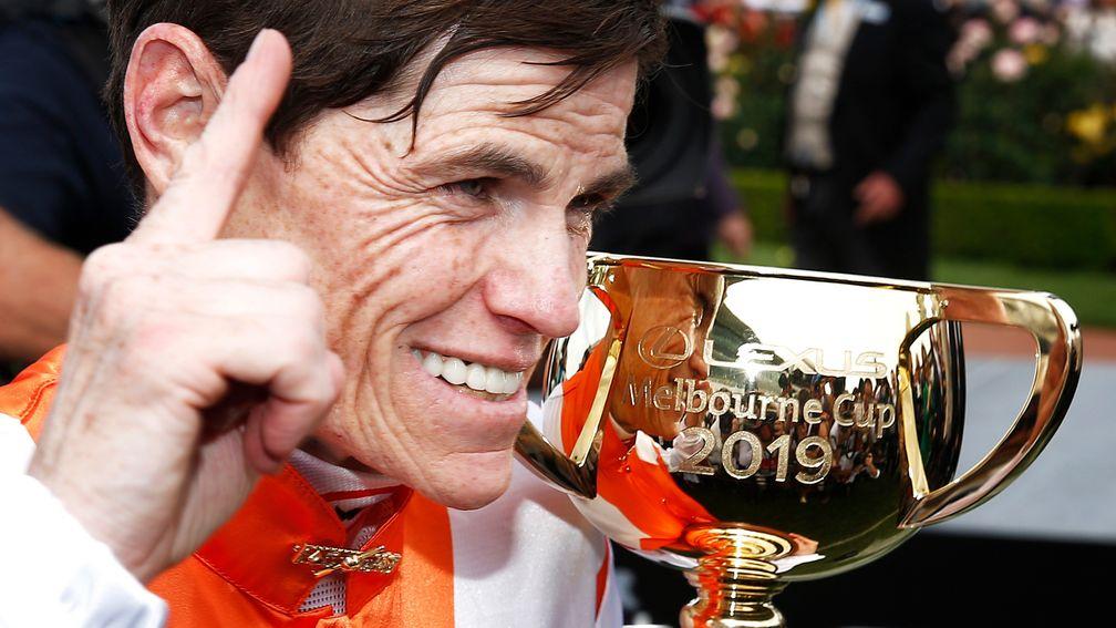 Craig Williams with the Melbourne Cup after his victory on Vow And Declare
