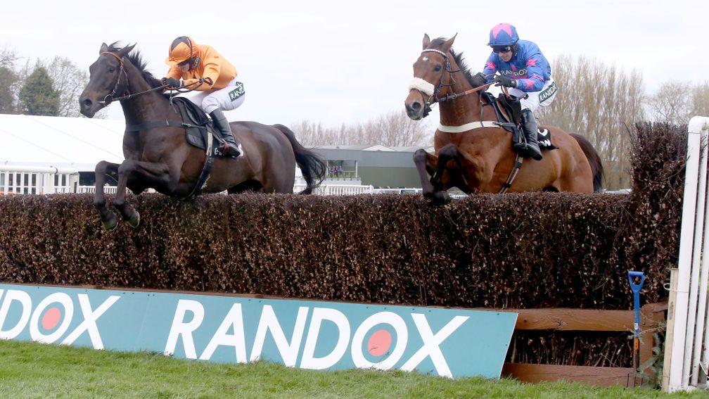 Tea For Two and Lizzie Kelly (orange silks) on the way to defeating Cue Card at Aintree
