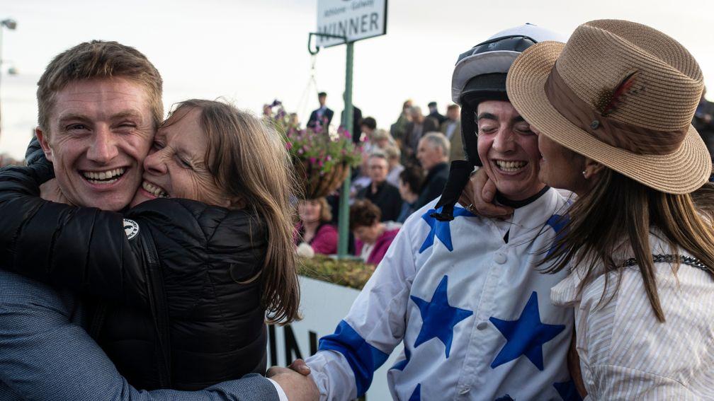 Denis Hogan is congratulated by jockey Joe Doyle's mother Claire after Make A Challenge struck for the first time at the Galway festival