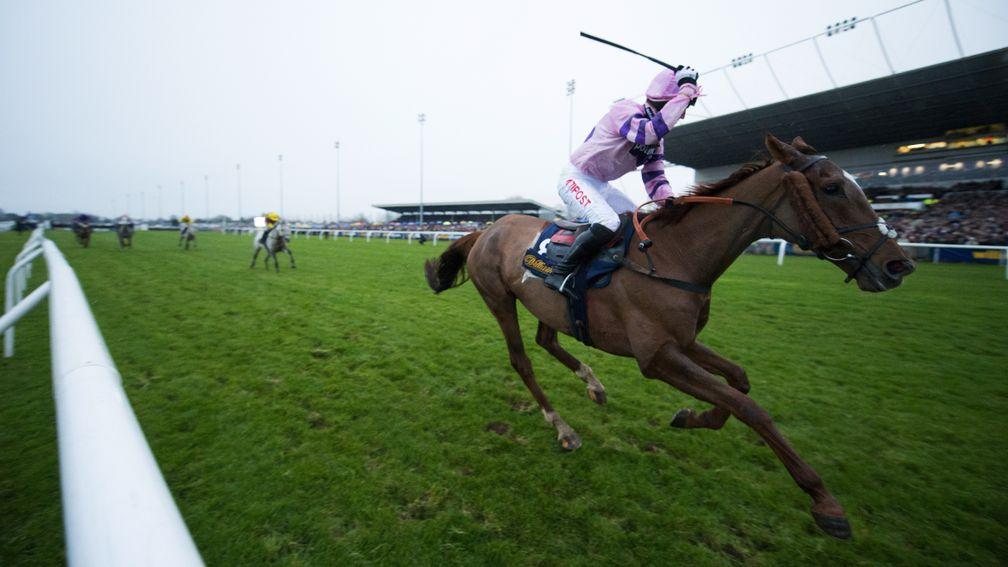 Noel Fehily celebrates as Silviniaco Conti draws clear to win a second King George