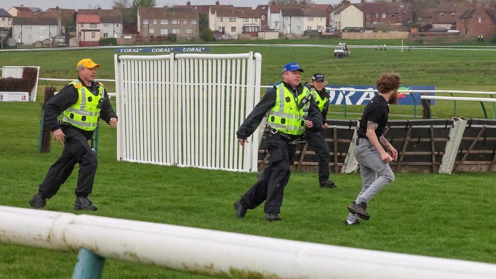 Ayr: protesters on the track ahead of the Scottish Grand National
