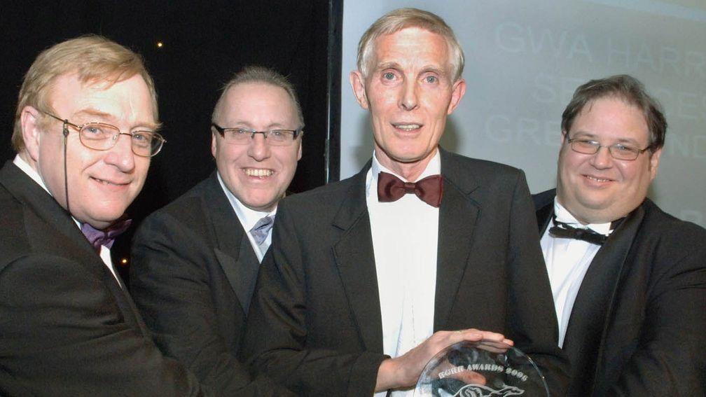 Bob Betts (second right) is honoured for his services to greyhound racing at the sport's awards night in 2007