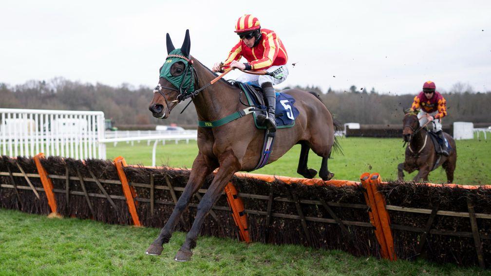 Top Ville Ben (Alain Cawley) jumps the final flight and wins the 2m 7f Cazoo HurdleLingfield 21.1.22 Pic: Edward Whitaker