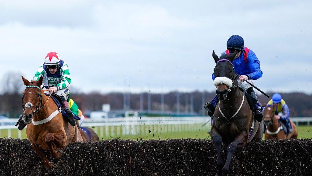 Malystic and Danny McMenamin (blue) on their way to victory at Doncaster