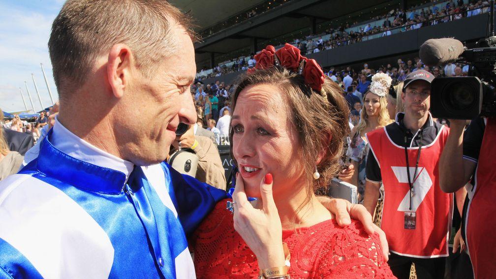 Hugh Bowman hugs wife Christine after he partnered Winx to victory in the George Ryder Stakes at Rosehill