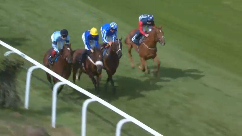 Broadspear (navy cap) enjoyed the run of the race but was unable to fend off his rivals