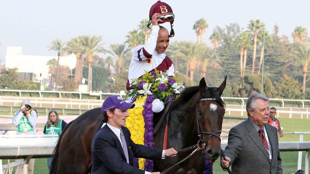 Benjamin Leon (right) leads in his late, much-loved dual Breeders' Cup winner Royal Delta