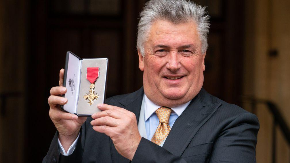Medal man: Paul Nicholls with his OBE presented by Prince Charles