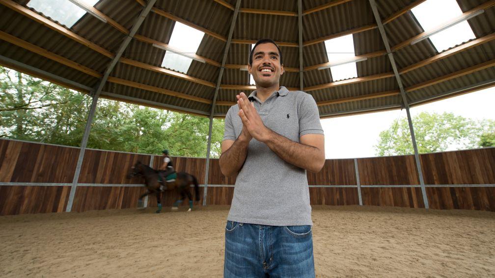 Sheikh Fahad observes his horses in the round pen at Longholes