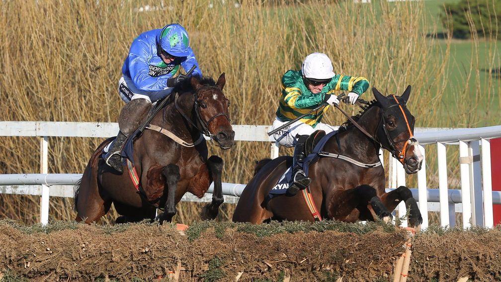 Hurricane Fly (left) and Jezki go head to head in the 2014 Ryanair Hurdle at Leopardstown