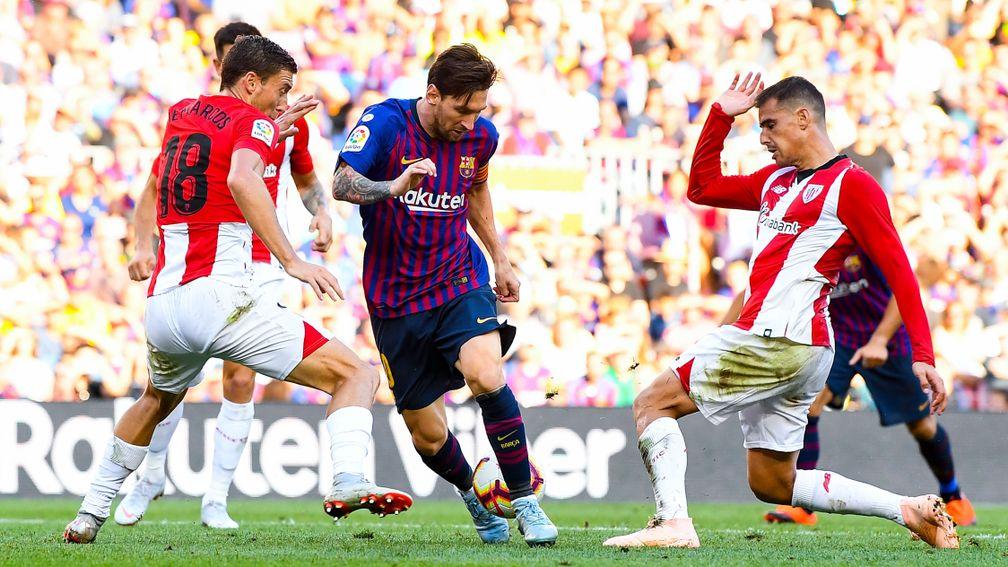 Athletic Bilbao players struggle to stop Leo Messi