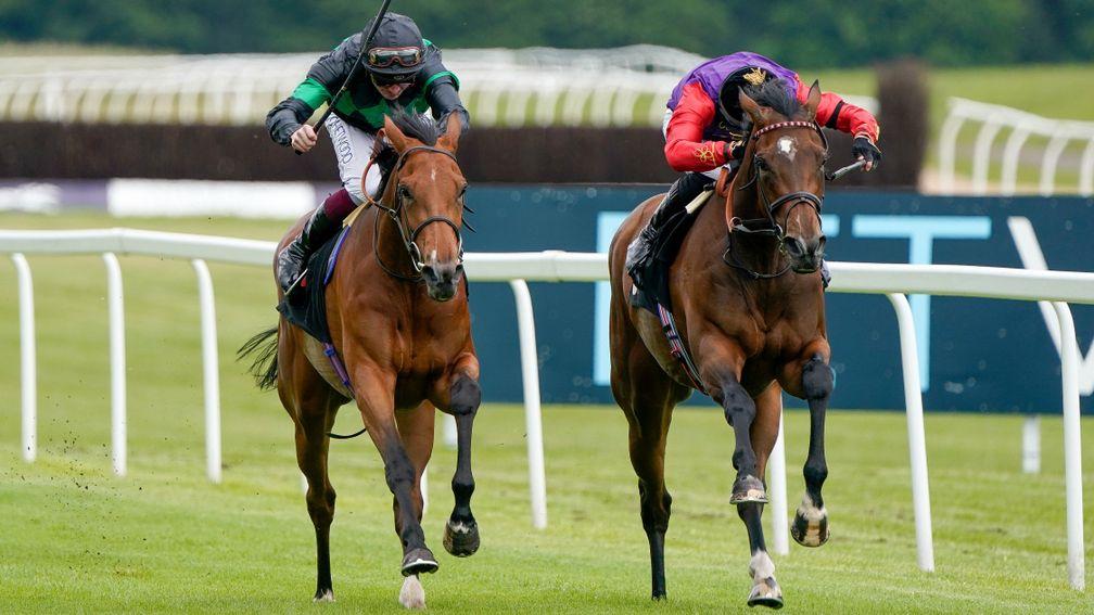 Tom Marquand (right) drives Perfect Alibi to victory at Newbury