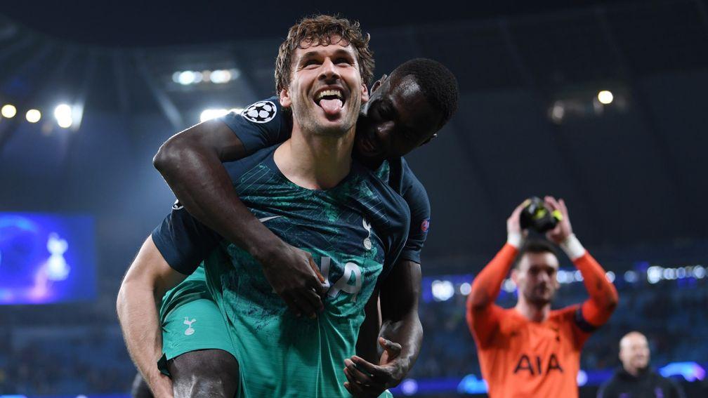 Tottenham's Fernando Llorente celebrates with Davinson Sanchez after the UEFA Champions League victory over Manchester City