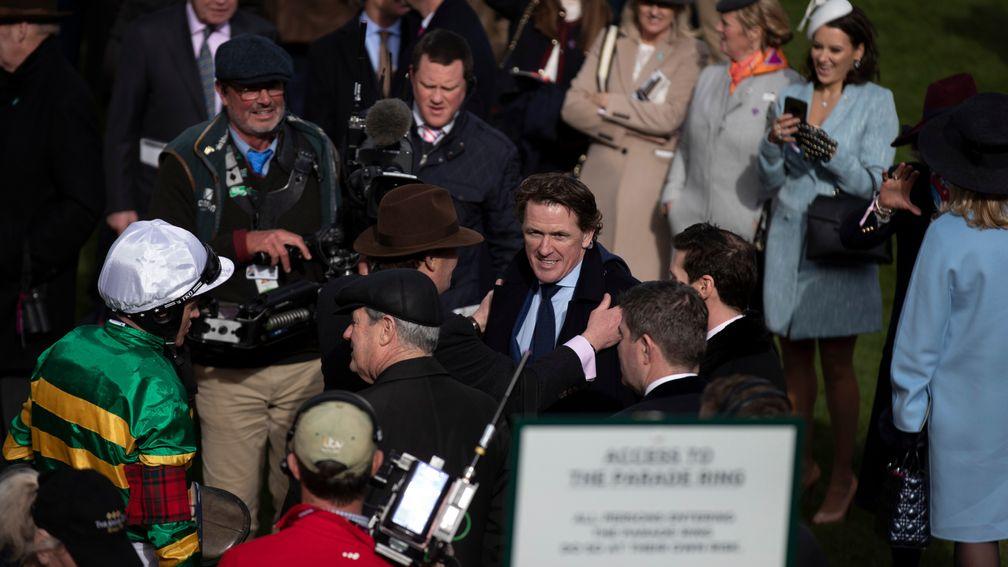Sir Anthony McCoy hugged by Nicky Henderson after Champâs win in the RSA Insurance Novicesâ Chase.Cheltenham Festival.Photo: Patrick McCann/Racing Post 11.03.2020