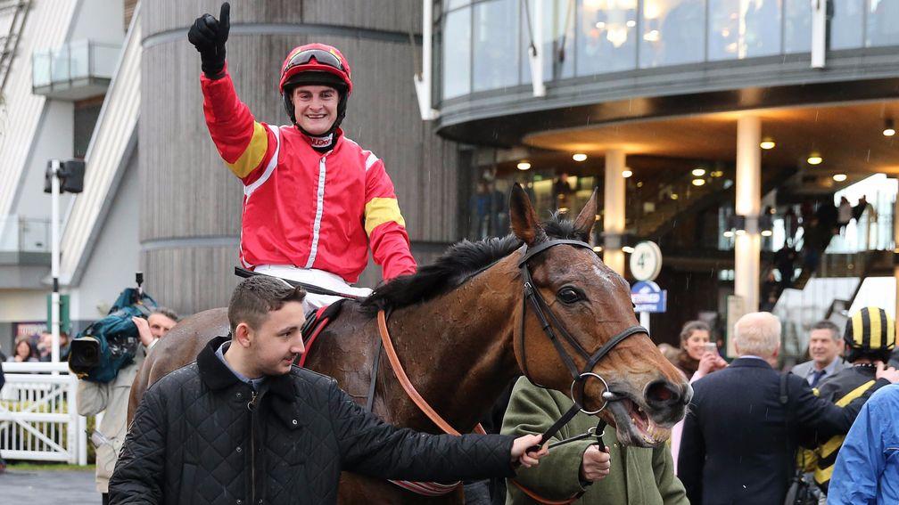 Henry Brooke celebrates victory in the Betfred Becher Chase aboard Highland Lodge