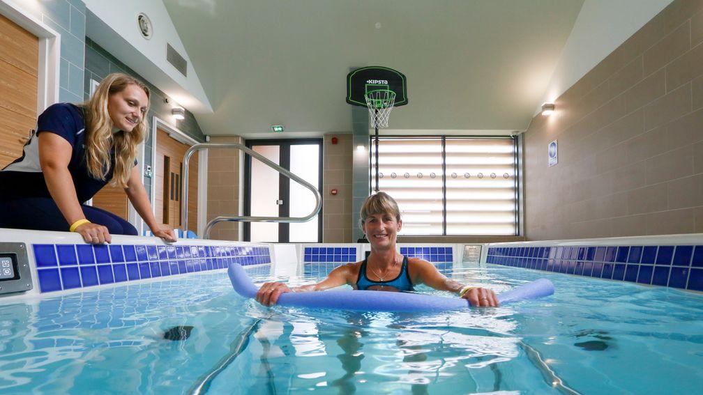 Jo Foster in the pool at Jack Berry House with physiotherapist Gemma Darley