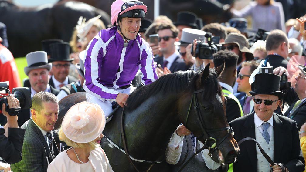 Wings Of Eagles returns to the Epsom winner's enclosure after landing the Derby