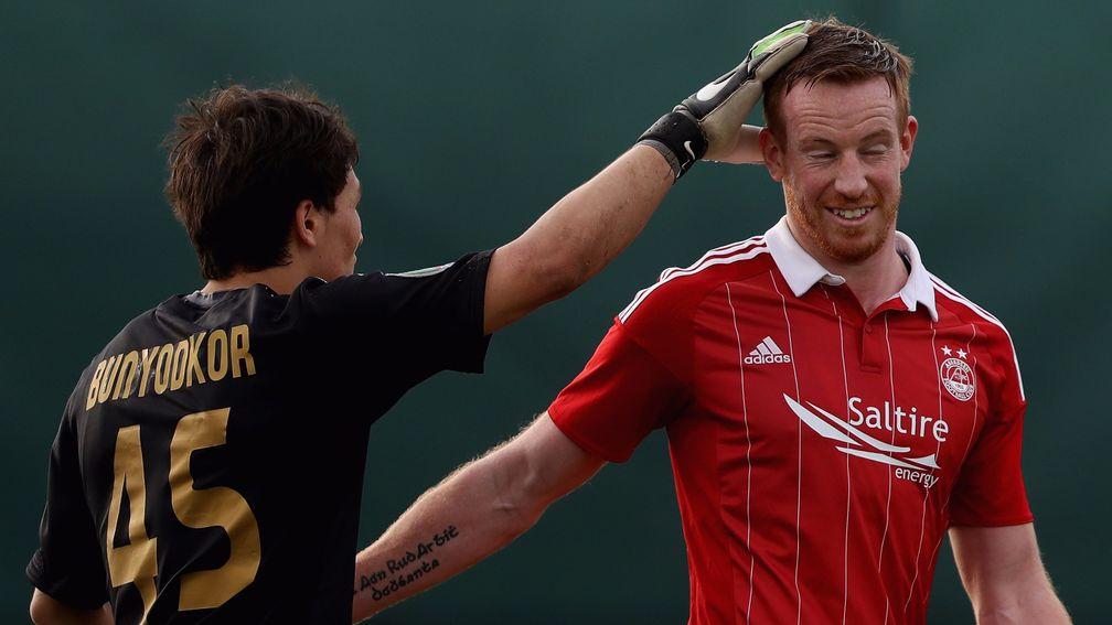 Adam Rooney (right) has swapped Aberdeen for Salford