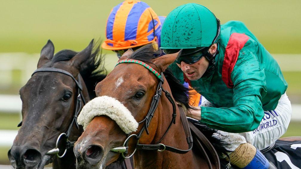 KILDARE, IRELAND - SEPTEMBER 11: Chris Hayes riding Tahiyra (green) win The Moyglare Stud Stakes at Curragh Racecourse on September 11, 2022 in Kildare, Ireland. (Photo by Alan Crowhurst/Getty Images)