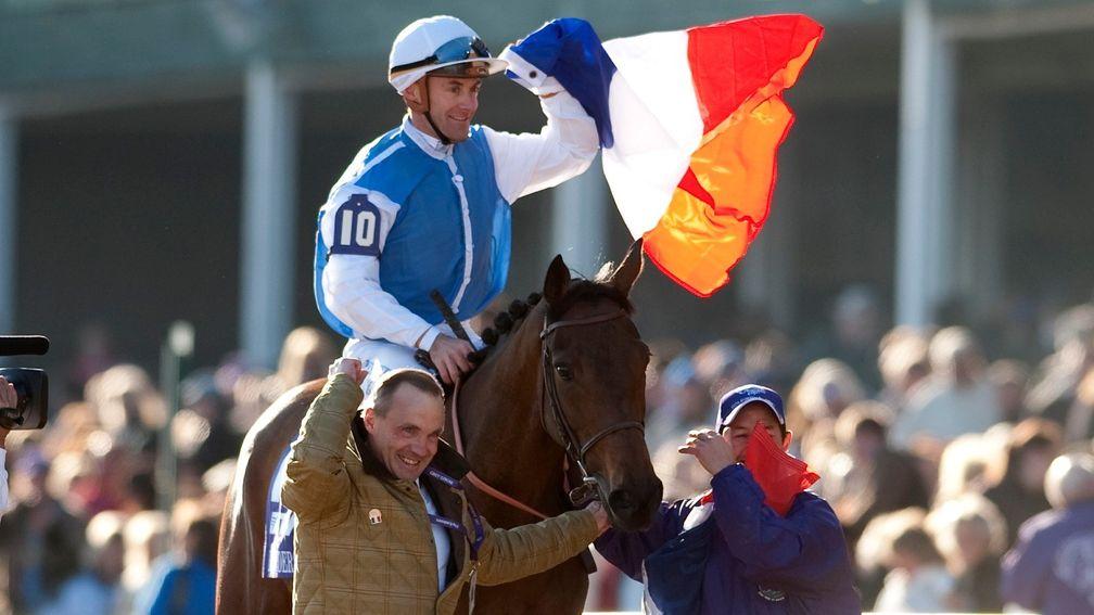 Viva La France: Regis Barbadette, Olivier Peslier and Thierry Blaise celebrate after Goldikova's third Breeders' Cup win