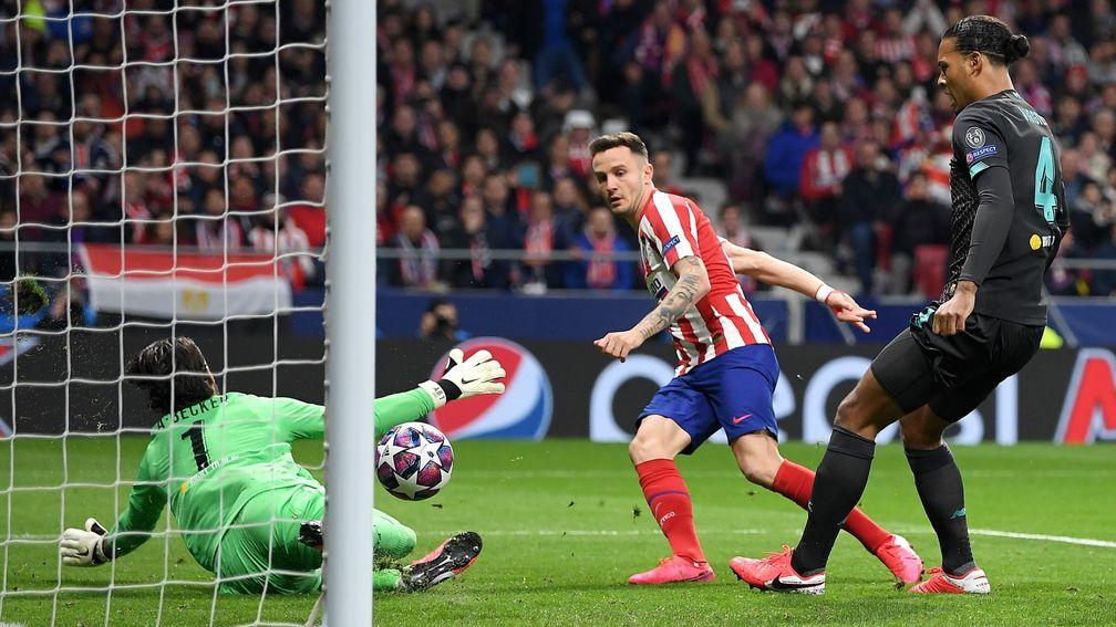 Saul Niguez scores for Atletico Madrid against Liverpool